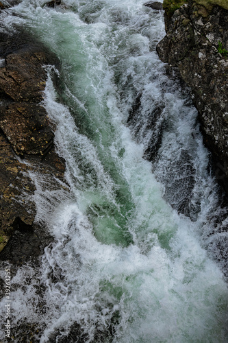 Huge waterfall with its river