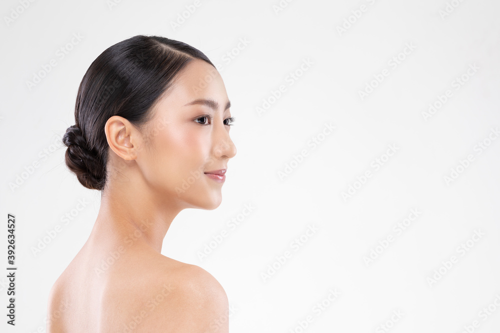 Side view of Beautiful Asian woman looking at camera smile with clean and fresh skin Happiness and cheerful with positive emotional,isolated on white background,Beauty and Cosmetics Concept Side view of Beautiful Asian woman looking at camera smile with clean and fresh skin Happiness and cheerful with positive emotional,isolated on white background,Beauty and Cosmetics Concept