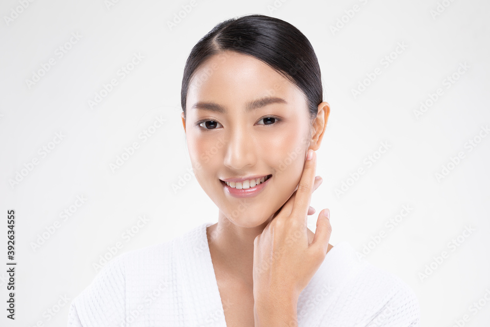 Beautiful young Asian woman touching soft cheek smile with clean and fresh skin Happiness and cheerful with positive emotional,isolated on white background,Beauty and Cosmetics Concept Beautiful young Asian woman touching soft cheek smile with clean and fresh skin Happiness and cheerful with positive emotional,isolated on white background,Beauty and Cosmetics Concept