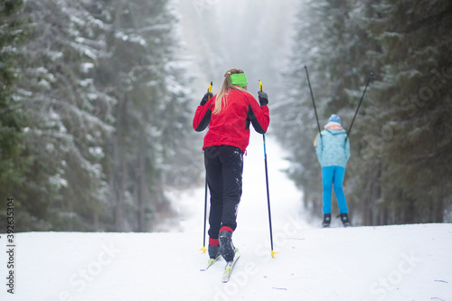 Cross country Skilling. A skier goes skiing on the ski track. photo