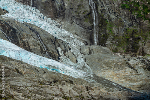 Small part of a glacier with a waterfall in Norway