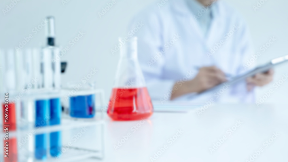 Technical scientist experiment analyzing medical solution at lab.. Technical scientist experiment analyzing medical solution at lab..