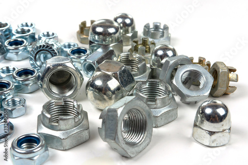 a large number of various industrial fasteners close-up photo
