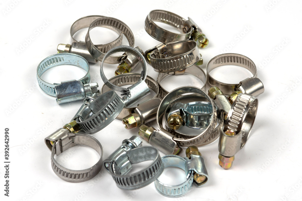 metal clamps on a white background to secure various products metal clamps on a white background to secure various products