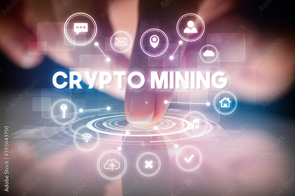 Finger touching tablet with web technology icons and CRYPTO MINING inscription, web technology concept Finger touching tablet with web technology icons and CRYPTO MINING inscription, web technology concept