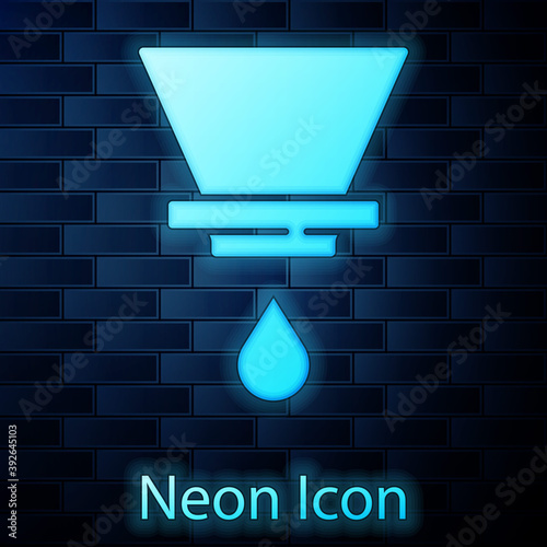 Glowing neon V60 coffee maker icon isolated on brick wall background. Vector.