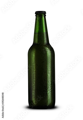 glass bottle with beer and drops