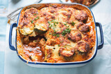 Moussaka with pork and courgettes