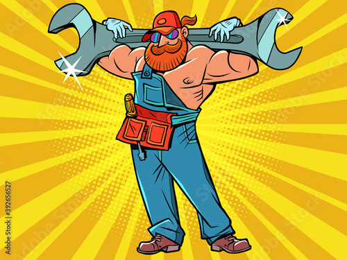 Muscular plumber with a monkey wrench