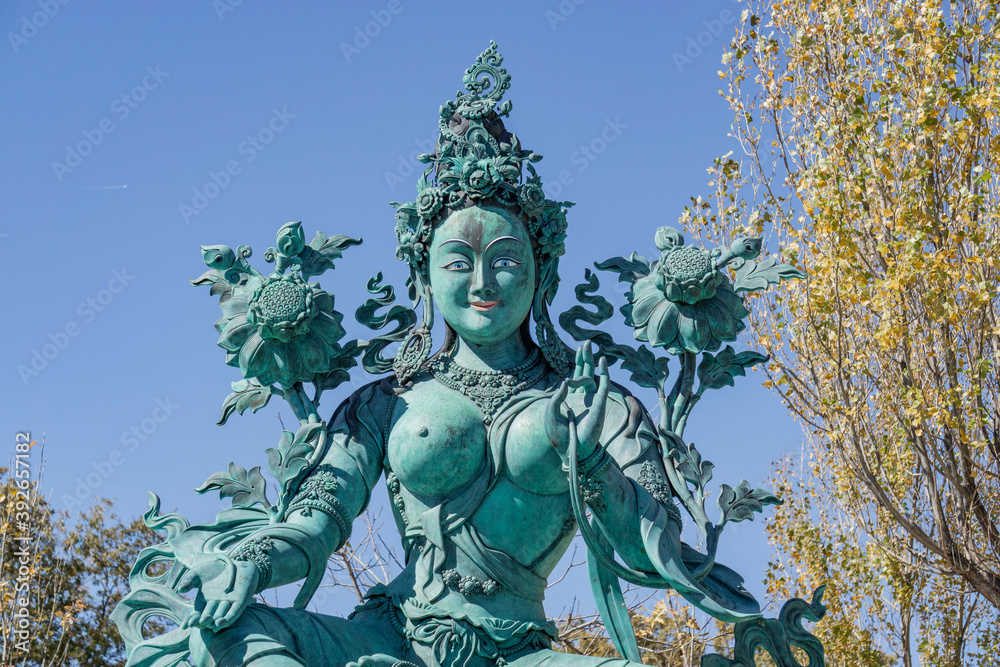 statue of tara, buddhist goddess - obrazy, fototapety, plakaty 