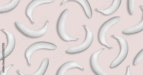 Pattern of white tropical bananas on pastel pink background. Creative minimal art concept. Vector illustration. Flat lay.