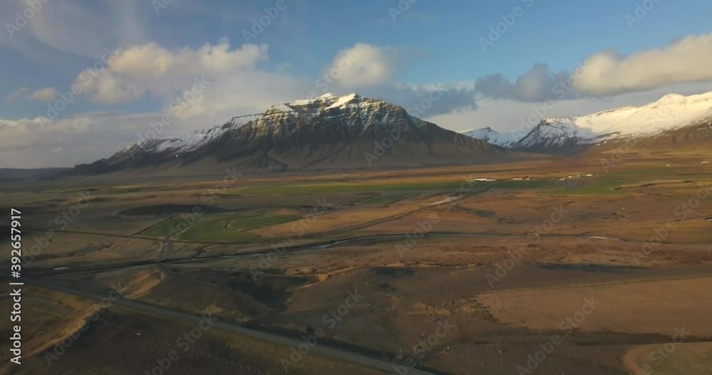 Aerial shot of a road and snowy mountains in Iceland
Aerial shot of a road and snowy mountains in Iceland