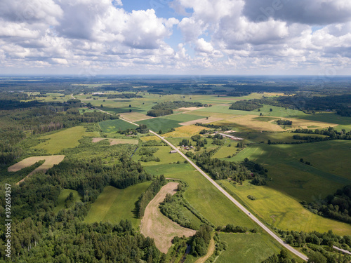 countryside aerial landscape with roads and green fields in summer
