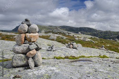 Norwegian tundra with cairns and rocky hills © merial