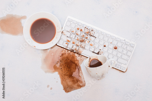 Wallpaper Mural A Cup of coffee spilled on the keyboard. Pour coffee on the keyboard in the office. Not good morning at work, spilled coffee Torontodigital.ca