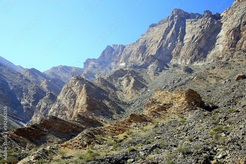 Panorama of the rocky mountains with unidirectional fractures, Wadi Bani Awf, Al Rustaq, South Batinah Governorate of Oman