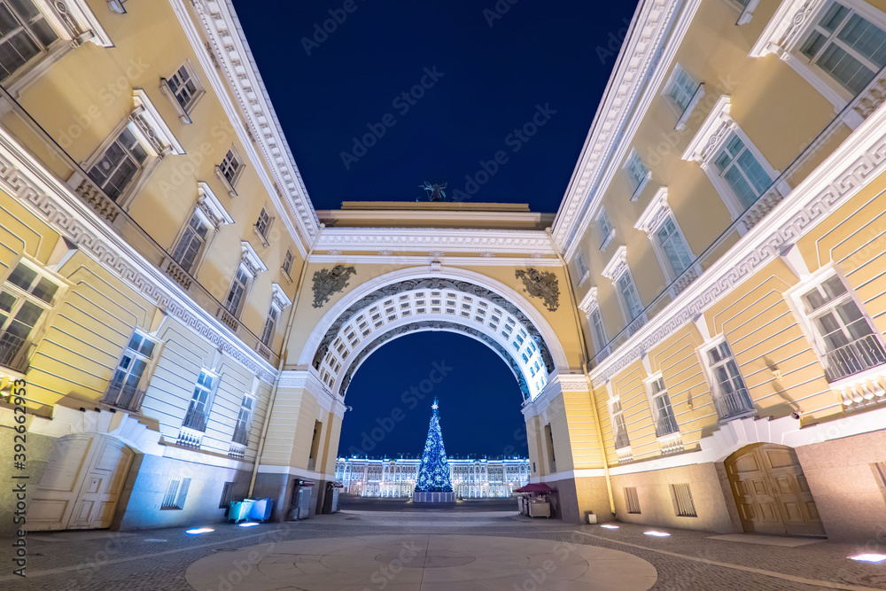 Christmas in Russia. New year in Saint-Petersburg. View of the Christmas tree on Palace square from the Arch of the General staff. Christmas tree near Hermitage. Center of Petersburg in the evening