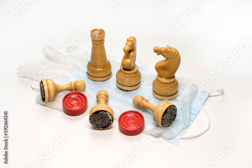 wooden chess pieces on the Medecin mask