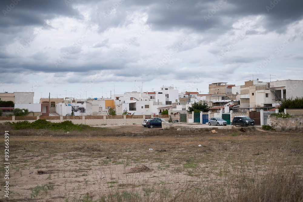 Specchiarica, Italy - September 02, 2020 : View of Specchiarica from the beach Specchiarica, Italy - September 02, 2020 : View of Specchiarica from the beach