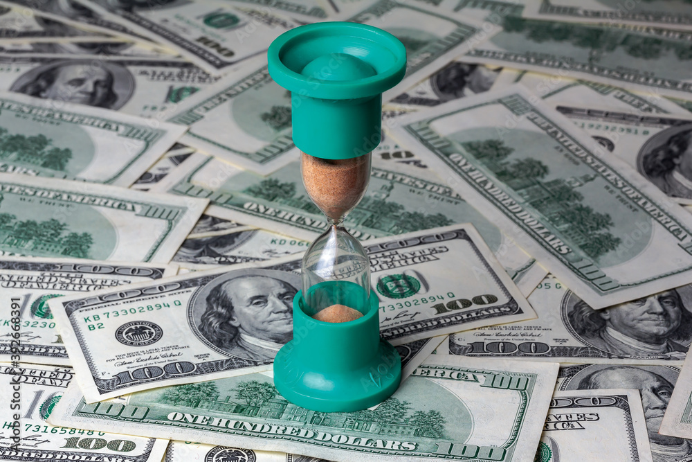 Time is money. Time and money management efficiency concept, hourglass ...