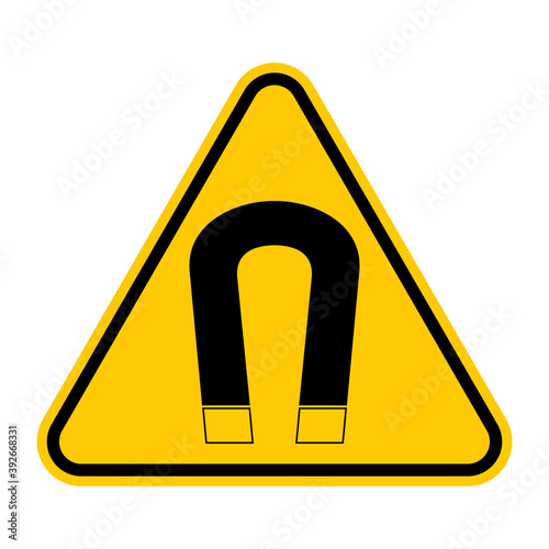 Magnetic field warning sign. Vector illustration of yellow triangle warning sign with horseshoe magnet icon inside. Caution dangerous radiation isolated on background. Symbol used in industry. 