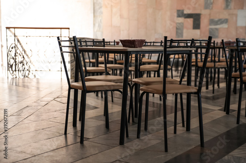 Simple cafeteria interior with set of stylish furniture © New Africa