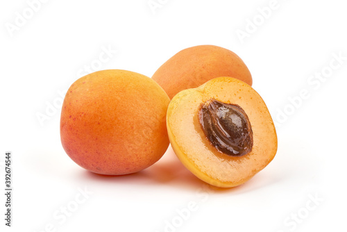 Juicy apricots, nectarines, isolated on white background