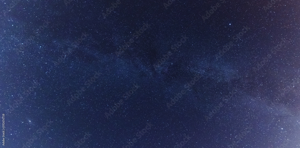 Fototapeta premium A magical starry night on the river by the Milky Way and a comet in the sky