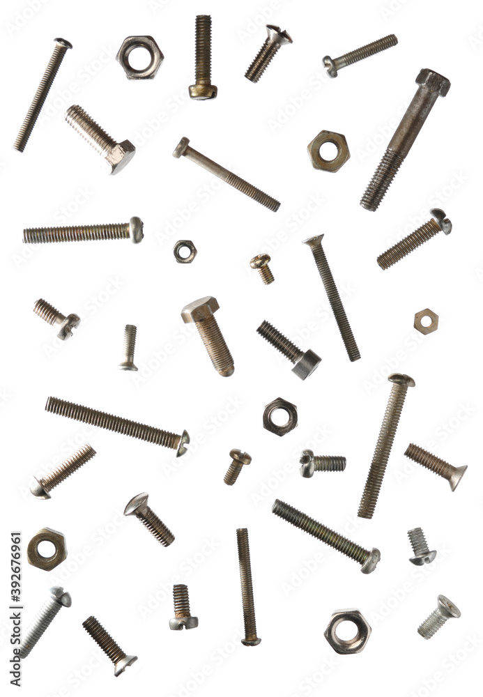 Abstract artistic background of assorted screws bolts and nuts isolated on white Abstract artistic background of assorted screws bolts and nuts isolated on white