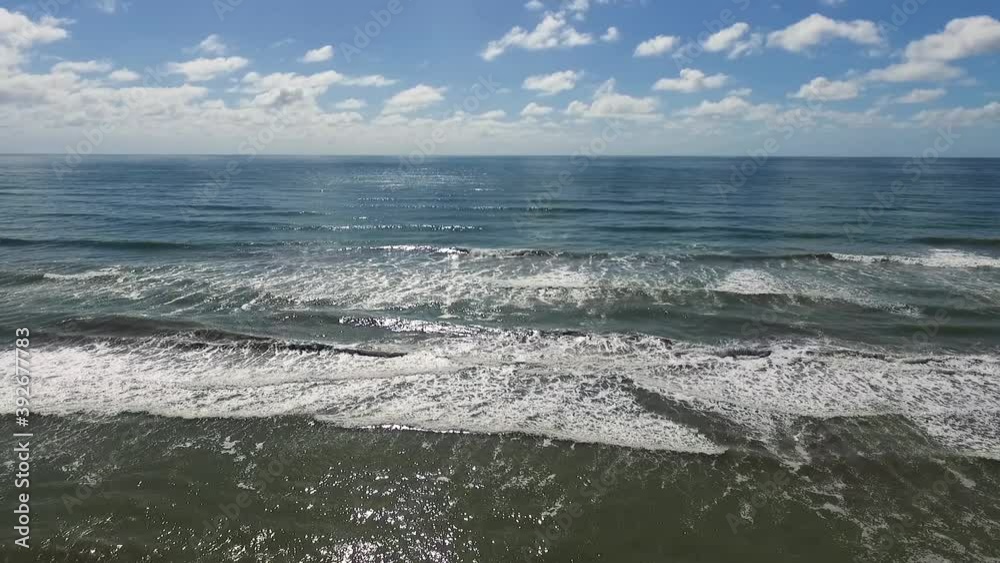 Sunny Summer Day Above Atlantic Ocean Horizon and Sandy Beach, Aerial View Sunny Summer Day Above Atlantic Ocean Horizon and Sandy Beach, Aerial View