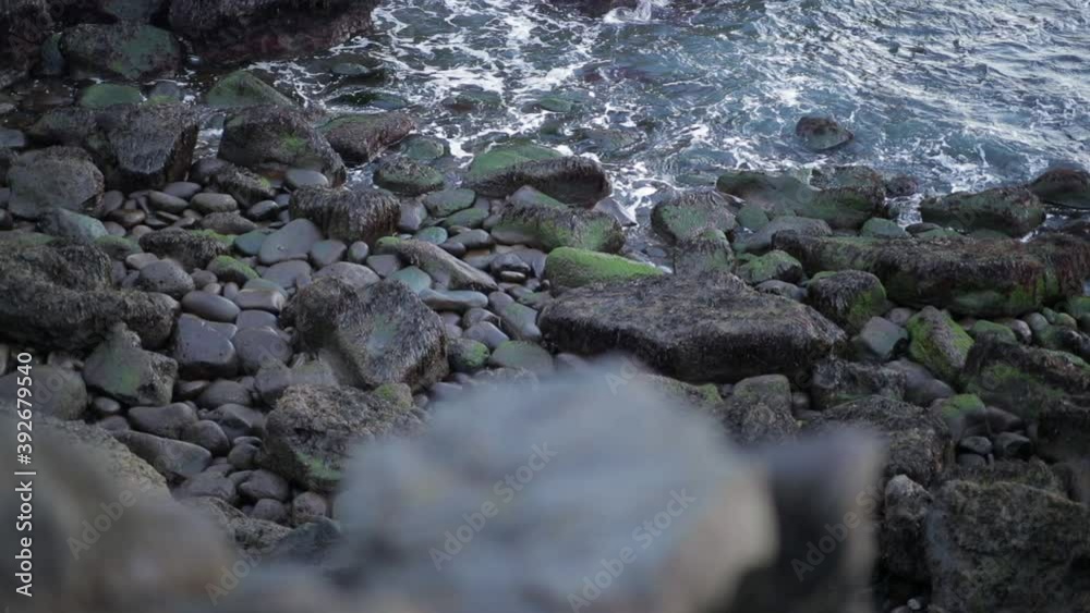 Waves crashing on a rocky beach in Iceland Waves crashing on a rocky beach in Iceland