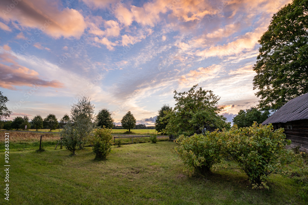 Traditional old farm house in Estonia. Sunset. Traditional old farm house in Estonia. Sunset.