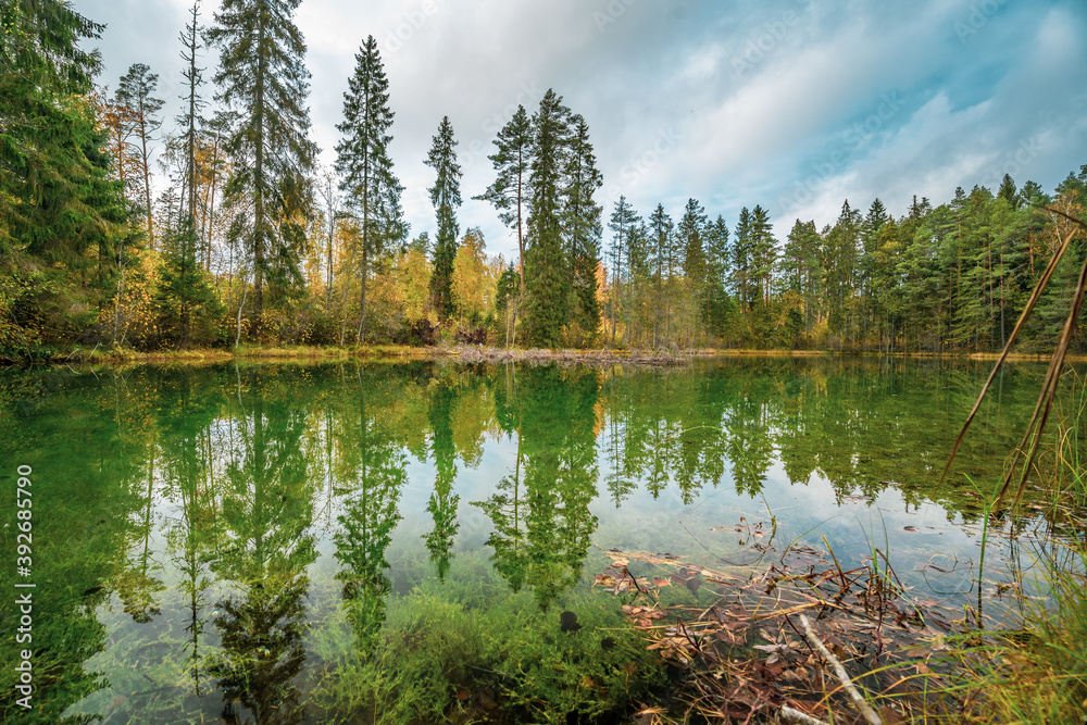 Beautiful blue lake in woods. autumn landscape. Beautiful blue lake in woods. autumn landscape.