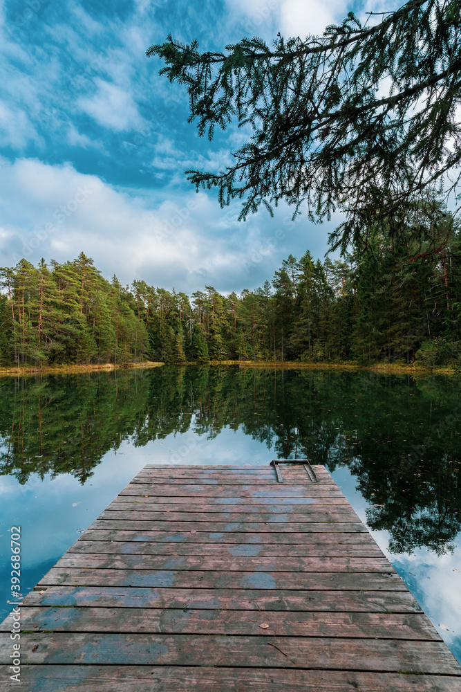 Beautiful blue lake in woods. autumn landscape. Beautiful blue lake in woods. autumn landscape.