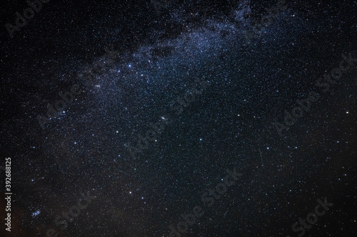 Overhead milky way with stars in clear summer night. Country side.
