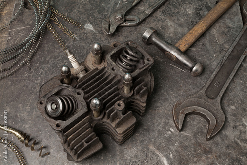 Old tools set on a vintage metallic background