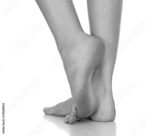 Closeup shot of female feet, isolated on white background