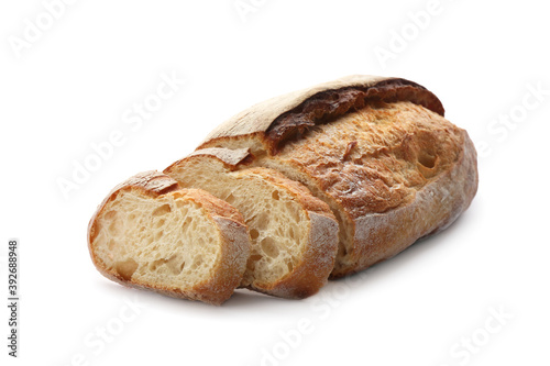 Cut freshly baked bread isolated on white