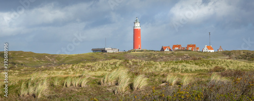 Panorama with scenic view of Lighthouse and rainy clouds at Waddenisland Texel, North Holland, Netherlands