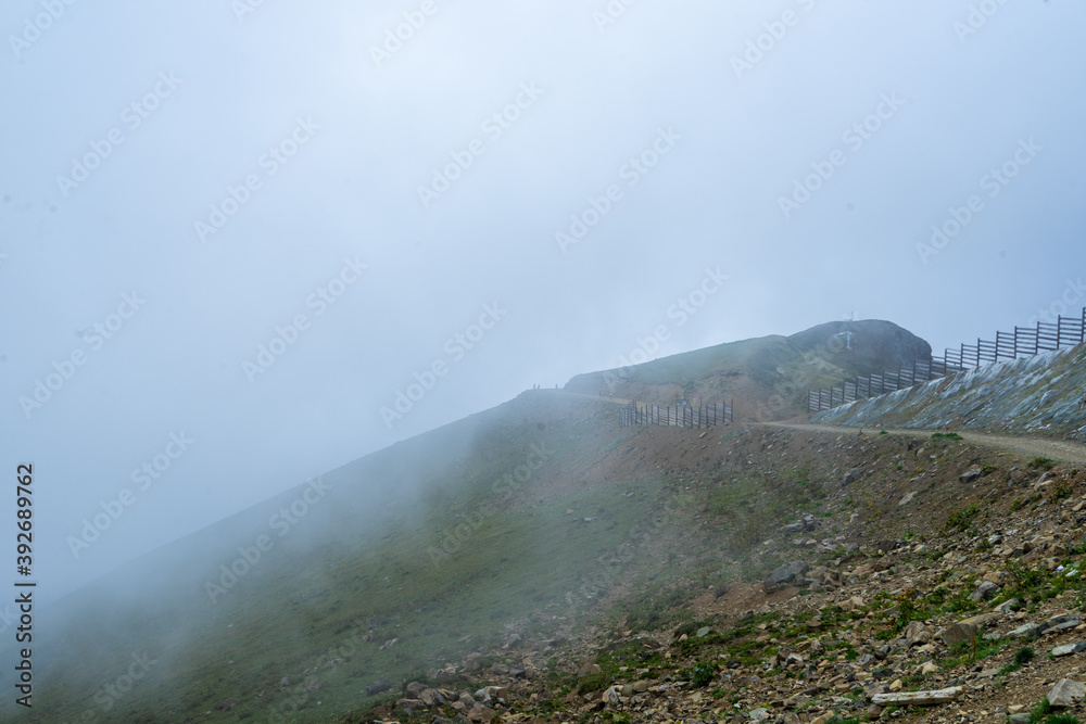 Fototapeta premium Fog in the mountains. Mountain landscape