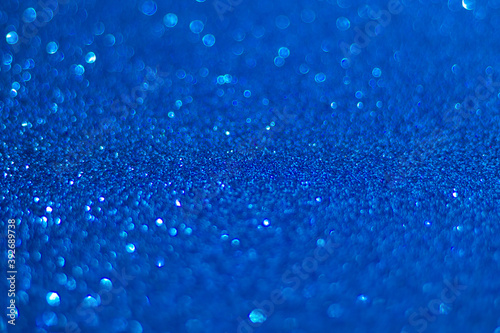 Universal celebration background,  perfect for Christmas, blue glitter, selective focus