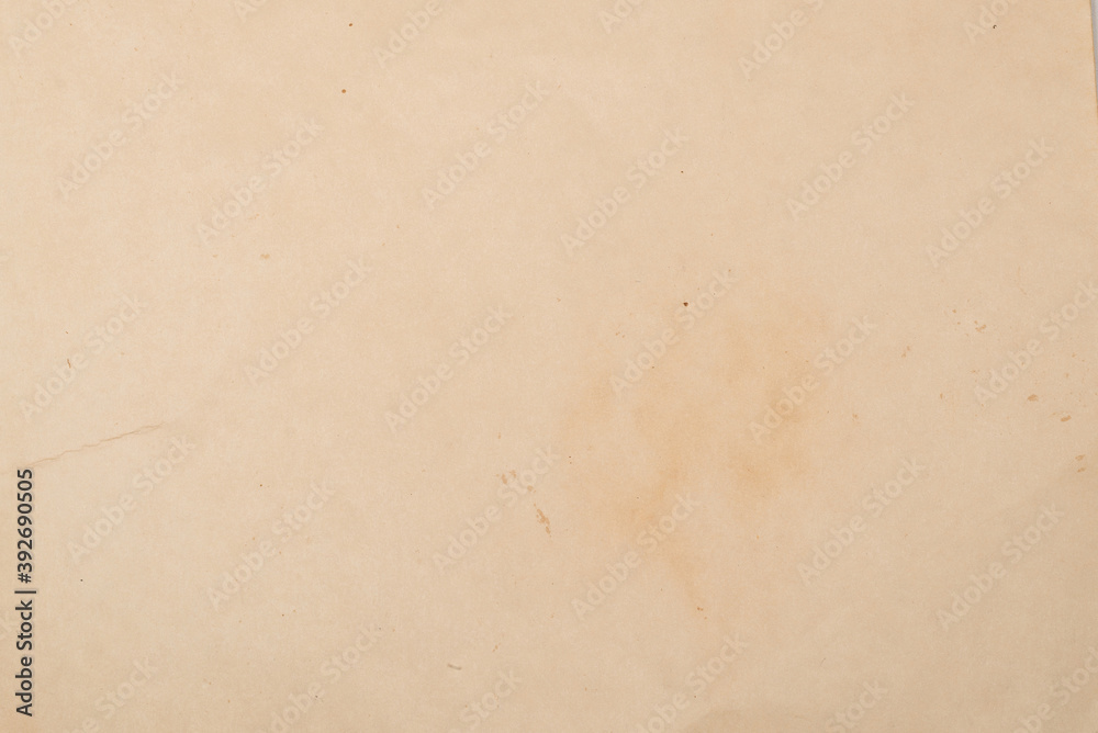 Old crumpled beige paper background. Old crumpled beige paper background.