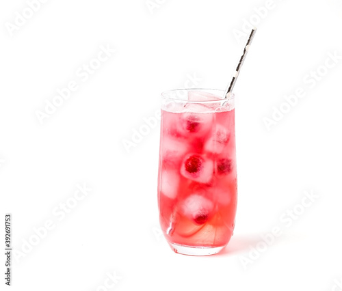 Cold cherry drink with ice on a white background, vyshnya frozen in ice