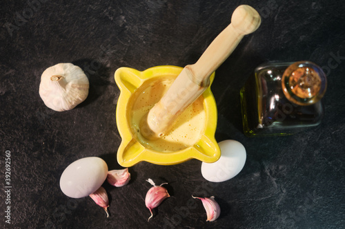 Tableau sur toile Ingredients of aioli sauce. Eggs, garlics and olive oil