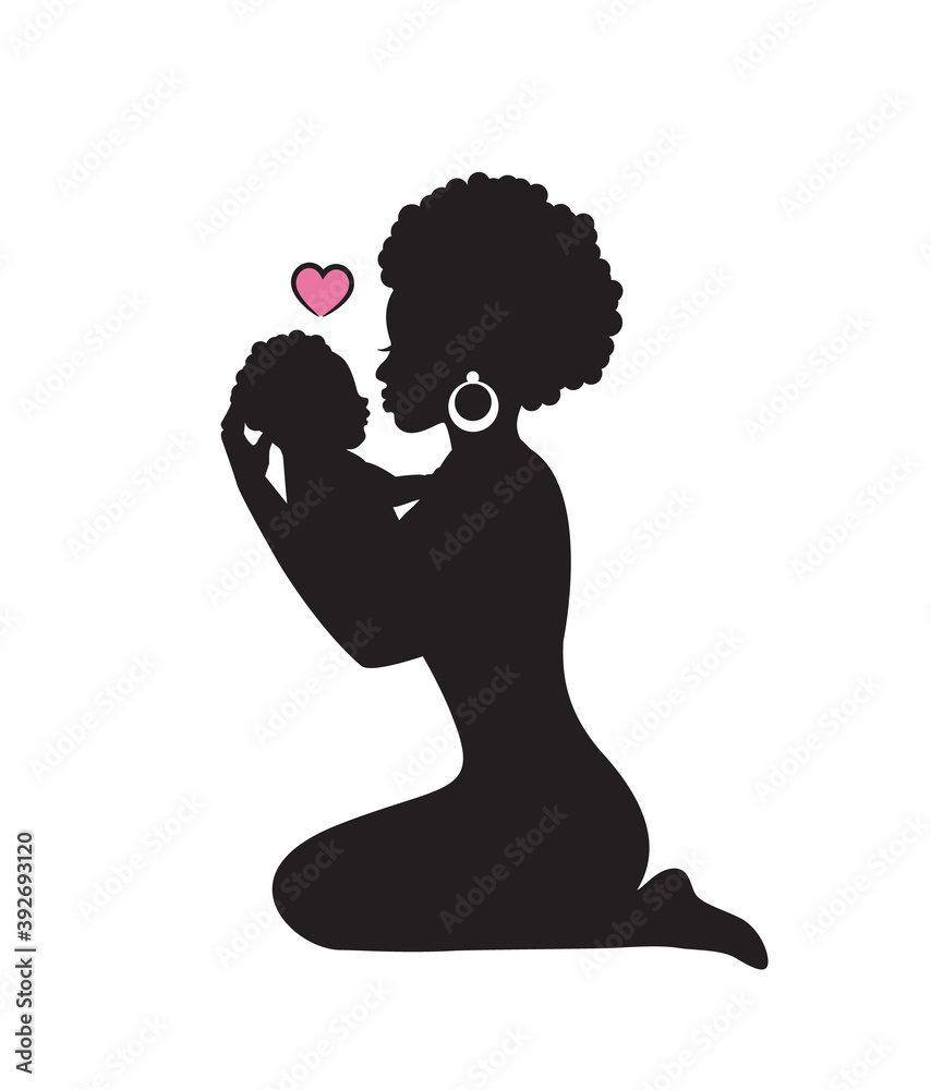 silhouette african woman sitting on her knees and holding a small child in her arms