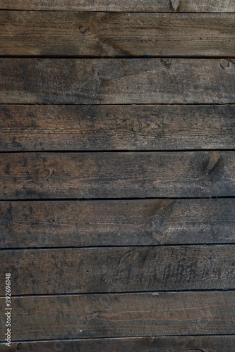 old brown wooden wall of planks textured background structure