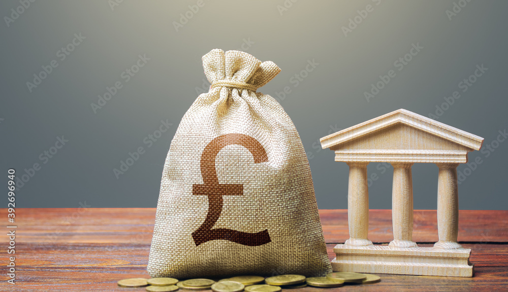 Αυτοκόλλητο British pound sterling money bag and bank / government building