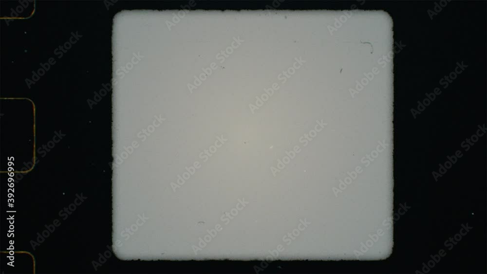 Super 8mm Film Frame Scan with sprocket hole, Square 3x4 Frame format. Light Leaks and abstract orange text overlay. For retro vintage look. Noise grain and scratches seamless texture. Torn edges
