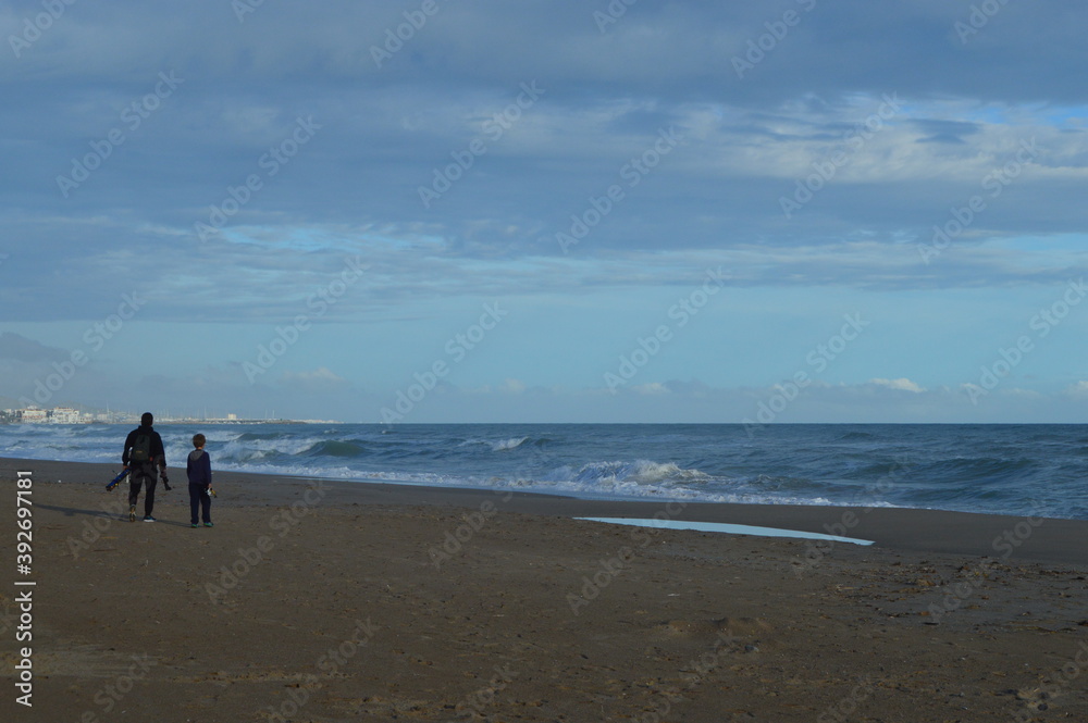 Padre e hijo en la playa