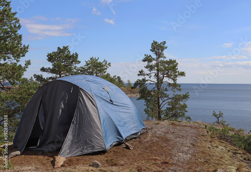 Tourist tent by the lake